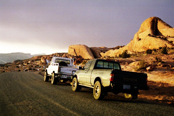 Heading back into Moab as the sun sets, Lions Back glows golden