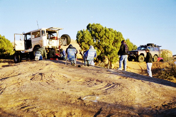 Only so many fingers can fit inside a third member, so the for the rest of the group, repairs become a spectator sport